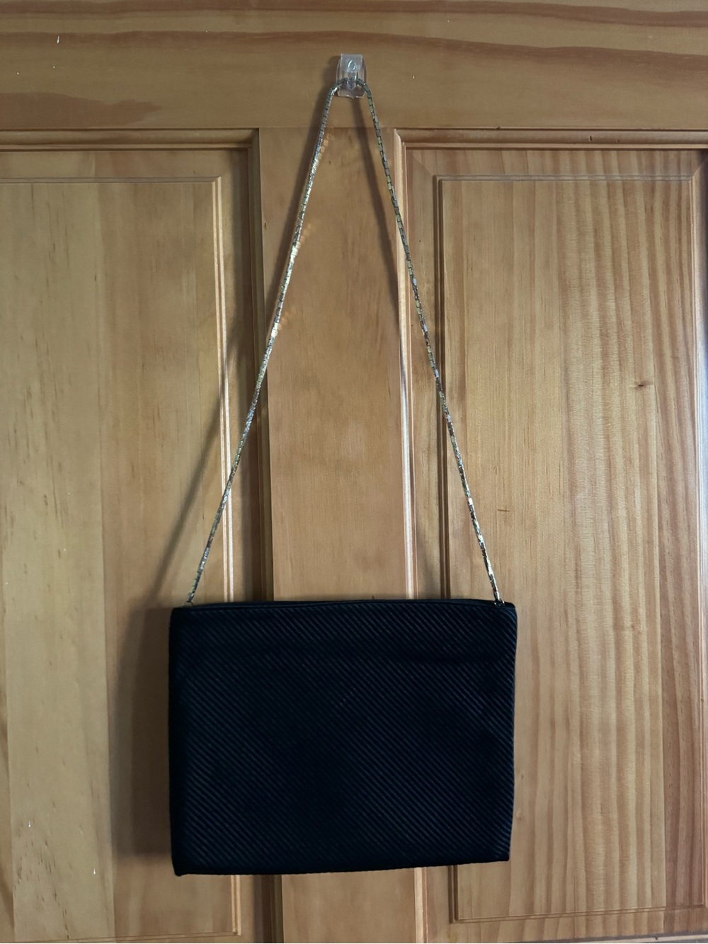 Reva black bag with gold chain strap